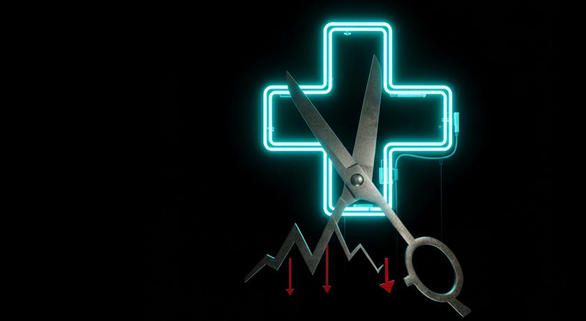 cruz de farmacia y tijera